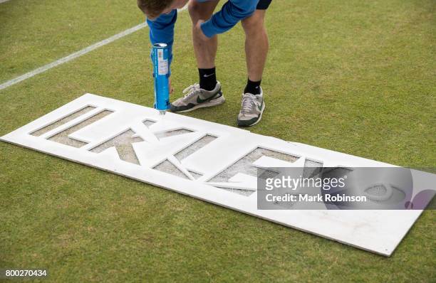 Ground Staff prepare the courts ahead of the Aegon Ilkley Trophy on June 24, 2017 in Ilkley, England.