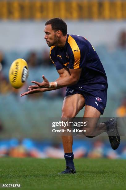 Josh Hill of the Eagles warms up during the round 14 AFL match between the West Coast Eagles and the Melbourne Demons at Domain Stadium on June 24,...