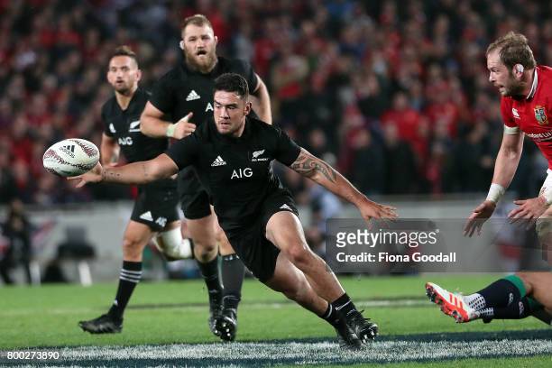 Codie Taylor of the All Blacks reaches for the ball during the Test match between the New Zealand All Blacks and the British & Irish Lions at Eden...