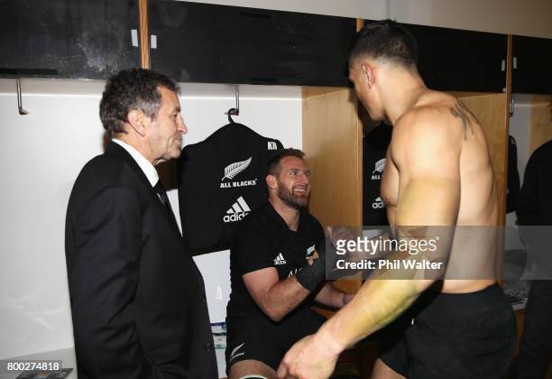 Kieran Read of the All Blacks celebrates with Sonny Bill Williams and assistant coach Wayne Smith in the dressing room after the first test match...