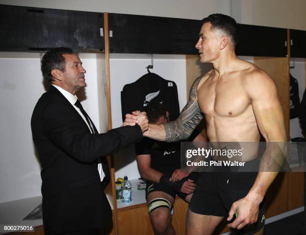 Sonny Bill Williams of the All Blacks and assistant coach Wayne Smith celebrate in the dressing room after the first test match between the New...