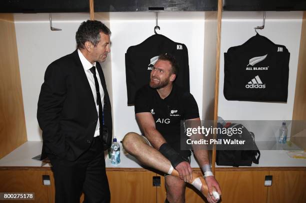 Kieran Read of the All Blacks celebrates with assistant coach Wayne Smith in the dressing room after the first test match between the New Zealand All...