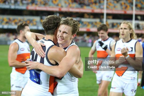 Lachie Whitfield of the Giants celebrates winning the round 14 AFL match between the Brisbane Lions and the Greater Western Sydney Giants at The...