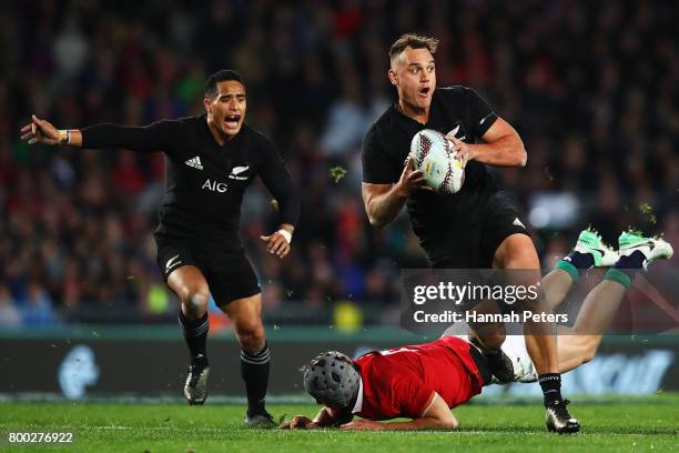 Israel Dagg of the All Blacks makes a break during the Test match between the New Zealand All Blacks and the British & Irish Lions at Eden Park on...