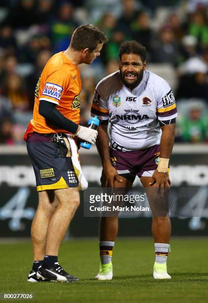 Sam Thaiday of the Broncos receives attention during the round 16 NRL match between the Canberra Raiders and the Brisbane Broncos at GIO Stadium on...