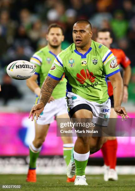 Junior Paulo of the Raiders passes during the round 16 NRL match between the Canberra Raiders and the Brisbane Broncos at GIO Stadium on June 24,...