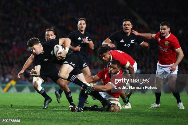 Beauden Barrett of the All Blacks makes a break during the Test match between the New Zealand All Blacks and the British & Irish Lions at Eden Park...