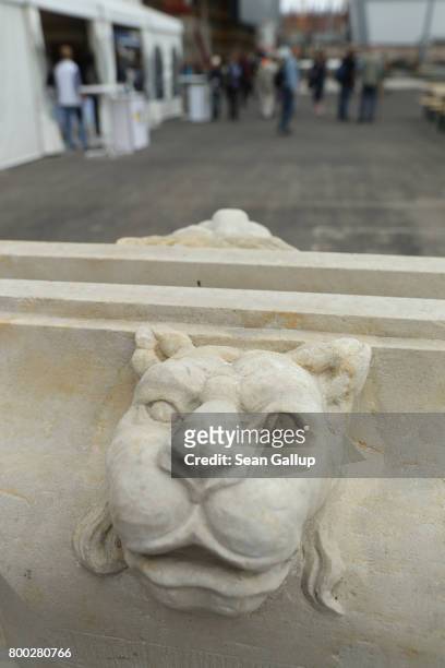 Lion's head decorates a facade element on display during open house day at the construction site of the Berlin City Palace, which will house the...