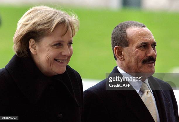 German Chancellor Angela Merkel greets Yemeni President Ali Abdullah Saleh with military honours on February 27, 2008 in the courtyard of the...