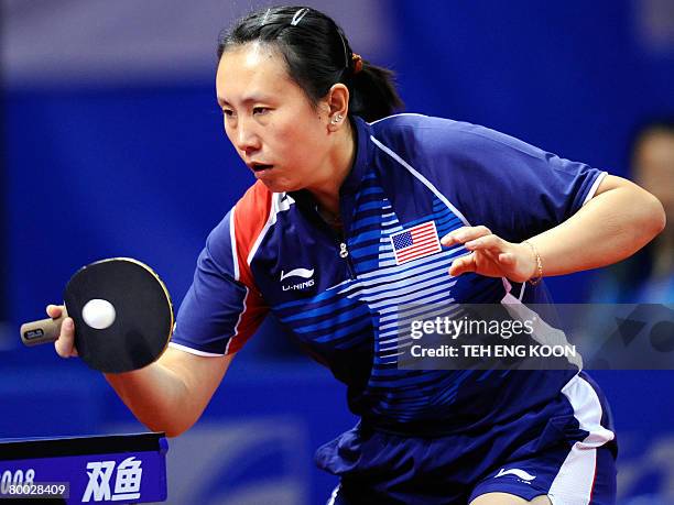 Gao Jun returns a shot against Austria's Li Qiangbing during the World Team Table Tennis Championship in Guangzhou, China's Guangdong Province on...