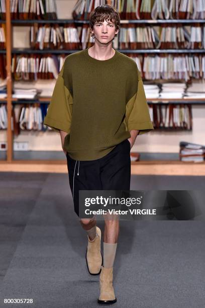 Model walks the runway during the Dries Van Noten Menswear Spring/Summer 2018 show as part of Paris Fashion Week on June 22, 2017 in Paris, France.