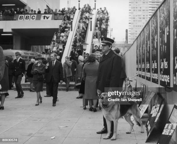 Delegates leave the conference hall in Brighton at the end of the Conservative Party Conference, 16th October 1971.