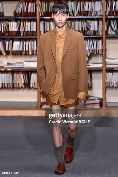 Model walks the runway during the Dries Van Noten Menswear Spring/Summer 2018 show as part of Paris Fashion Week on June 22, 2017 in Paris, France.