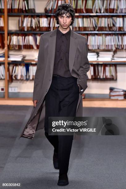 Model walks the runway during the Dries Van Noten Menswear Spring/Summer 2018 show as part of Paris Fashion Week on June 22, 2017 in Paris, France.