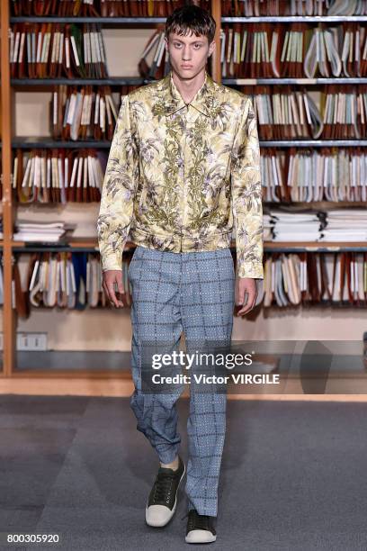 Model walks the runway during the Dries Van Noten Menswear Spring/Summer 2018 show as part of Paris Fashion Week on June 22, 2017 in Paris, France.