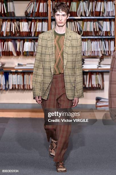 Model walks the runway during the Dries Van Noten Menswear Spring/Summer 2018 show as part of Paris Fashion Week on June 22, 2017 in Paris, France.