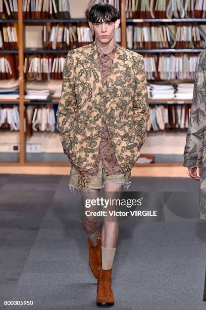 Model walks the runway during the Dries Van Noten Menswear Spring/Summer 2018 show as part of Paris Fashion Week on June 22, 2017 in Paris, France.