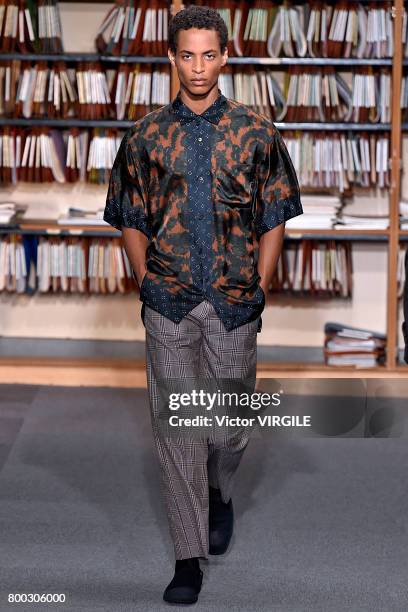 Model walks the runway during the Dries Van Noten Menswear Spring/Summer 2018 show as part of Paris Fashion Week on June 22, 2017 in Paris, France.