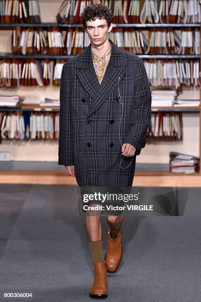 Model walks the runway during the Dries Van Noten Menswear Spring/Summer 2018 show as part of Paris Fashion Week on June 22, 2017 in Paris, France.