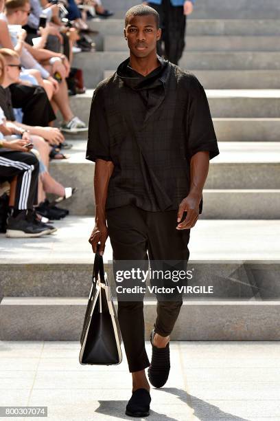 Model walks the runway during the Issey Miyake Men Menswear Spring/Summer 2018 show as part of Paris Fashion Week on June 22, 2017 in Paris, France.