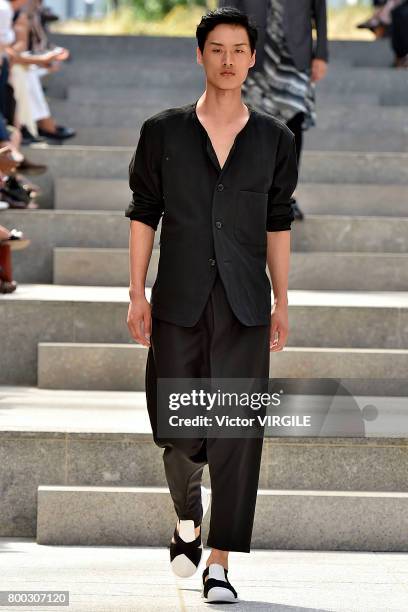 Model walks the runway during the Issey Miyake Men Menswear Spring/Summer 2018 show as part of Paris Fashion Week on June 22, 2017 in Paris, France.