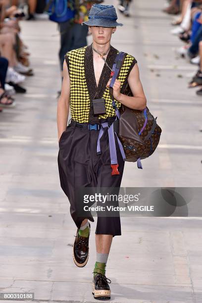 Model walks the runway during the Louis Vuitton Menswear Spring/Summer 2018 show as part of Paris Fashion Week on June 22, 2017 in Paris, France.