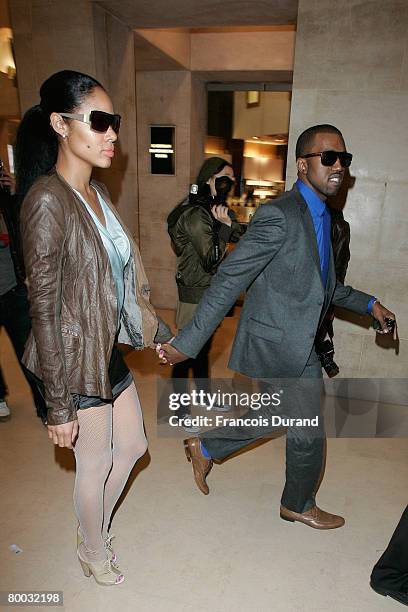 Kanye West and Alexis Phifer arrive to attend the Emmanuel Ungaro show, during the autumn/winter 2008-2009 ready-to-wear collection show on February...