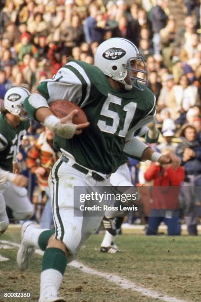 George Buttle Linebacker Greg Buttle of the New York Jets returns an interception ...