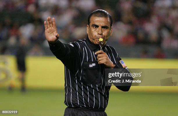 Referee Baldomero Toledo blows the final whistle to give Chivas USA the regular season Western Conference title following a scoreless draw with...