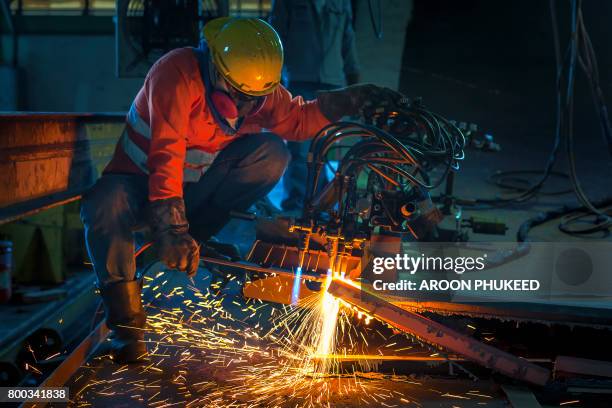 heavy metal industry - sawing stock pictures, royalty-free photos & images