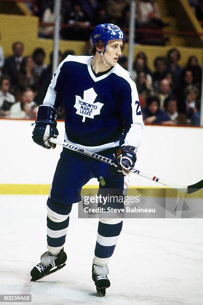 Borje Salming of the Toronto Maple Leafs skates to defend goal in game against the Boston Bruins at Boston Garden.