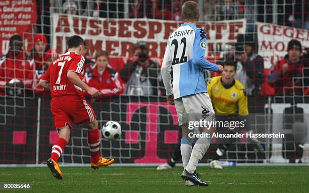 Franck Ribery of Bayern Munich scores the winning goal with a penalty kick during the DFB Cup quarterfinal match between FC Bayern Munich and TSV...