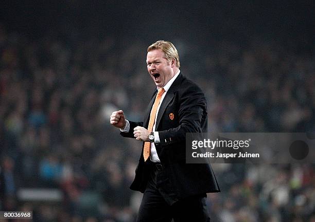 Coach Ronald Koeman of Valencia celebrates his team's goal during the Copa del Rey semi final match between Barcelona and Valencia at the Camp Nou...