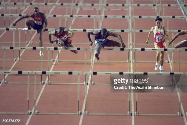 Allen Johnson of the United States and Colin Jackson of Great Britain compete in the Men's 110m Hurdles during the TOTO Super Athletic Championships...