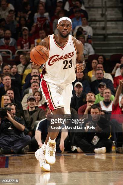 LeBron James of the Cleveland Cavaliers moves the ball up court during the game against the Memphis Grizzlies at Quicken Loans Arena on February 24,...