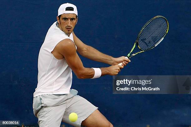 Potito Starace of Italy plays a backhand against Peter Luczak of Australia during day three of the Abierto Mexicano Telcel Open February 27, 2008 in...