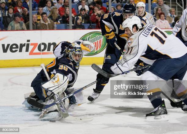 Ryan Miller of the Buffalo Sabres makes a save on David Legwand of the Nashville Predators on February 27, 2008 at HSBC Arena in Buffalo, New York....