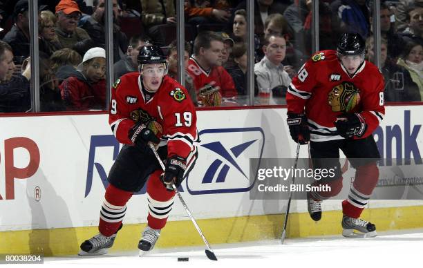 Jonathan Toews of the Chicago Blackhawks handles the puck as teammate Patrick Kane supports him against the Phoenix Coyotes on February 27, 2008 at...