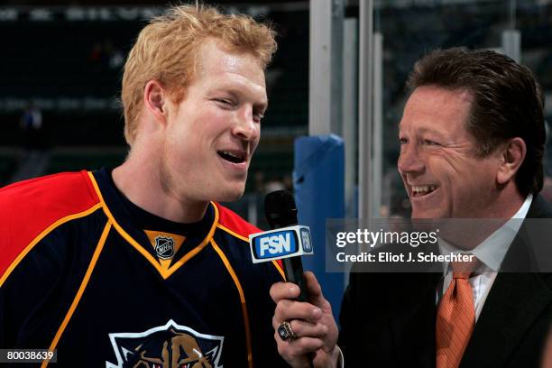 Wade Belak of the Florida Panthers is interviewed by Denis Potvin prior to the start of the game against the Toronto Maple Leafs at the Bank Atlantic...