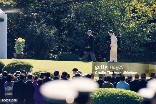 Emperor Akihito and Empress Michiko attend the autumn garden party at Akasaka Imperial Garden on October 25, 1995 in Tokyo, Japan.