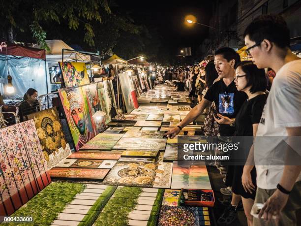 sunday street night market chiang mai thailand - chiang mai sunday market stock pictures, royalty-free photos & images