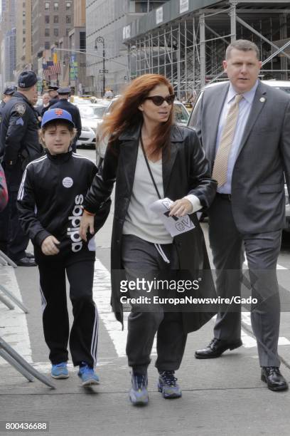 Actress Debra Messing joined thousands of New Yorkers and visiting demonstrators for a March On Tax Day to demand that President Donald Trump release...