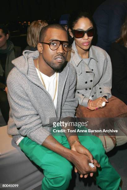 Singer Kanye West and Alexis Pfeiffer attend the Stella McCartney Fashion show, during Paris Fashion Week Fall-Winter 2008-2009 at the Carreau du...