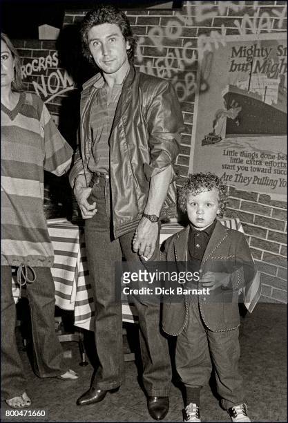 Kenney Jones of The Who, portrait with his son, Grunts in Covent Garden, London, 1980.