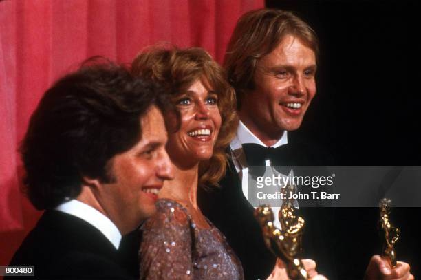 Actor Jon Voight and actress Jane Fonda hold their Oscars at the Academy Awards April 9, 1979 in Los Angeles, CA. Both Voight and Fonda won Oscars...