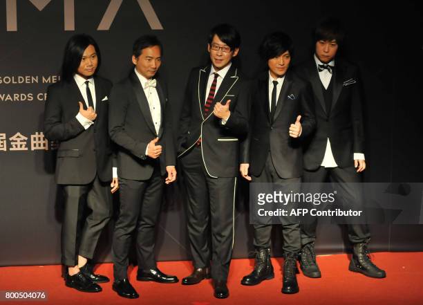 Taiwanese pop band Mayday arrives to attend the 28th Golden Melody Awards in Taipei on June 24, 2017. Some of Mandarin pop's biggest names have...