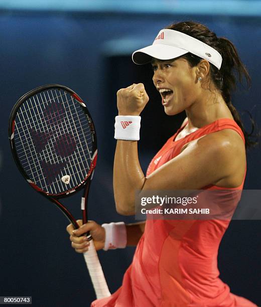 Ana Ivanovic of Serbia reacts after winning a point against Elena Dementieva of Russia during their tennis match for the WTA Dubai Tennis...