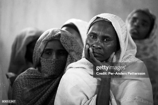 Women at the Oure Cassoni refugee camp on July 26, 2007 about 23 kilometers outside Bahai, Chad. Since 2003, Darfur's Janjawid militia and the...
