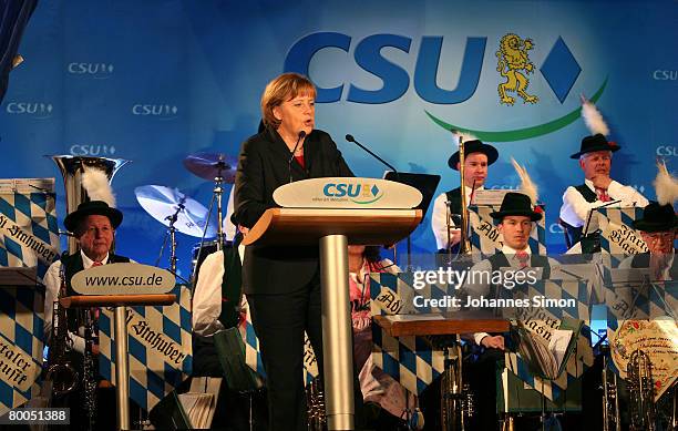 German Chancellor Angela Merkel delivers a speech during a CSU party rally in the Augustiner beer cellar on February 28, 2008 in Munich, Germany. The...