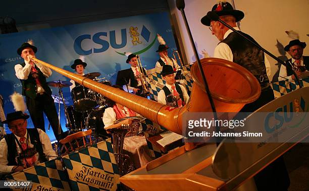Traditional Bavarian Brass band "Isartaler Blasmusik" performs during a CSU party rally in the Augustiner beer cellar on February 28, 2008 in Munich,...